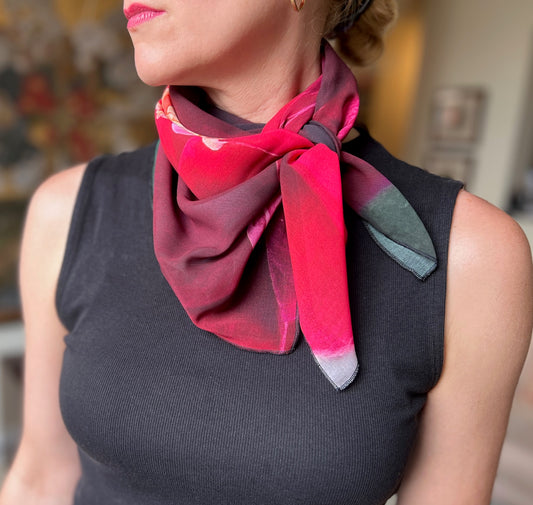 This stunning red floral scarf is entitled Amour. The colors are vibrant and perfect for a gorgeous pop of color around the neck, as a head scarf or even for the dog! Ethically made, made to order 