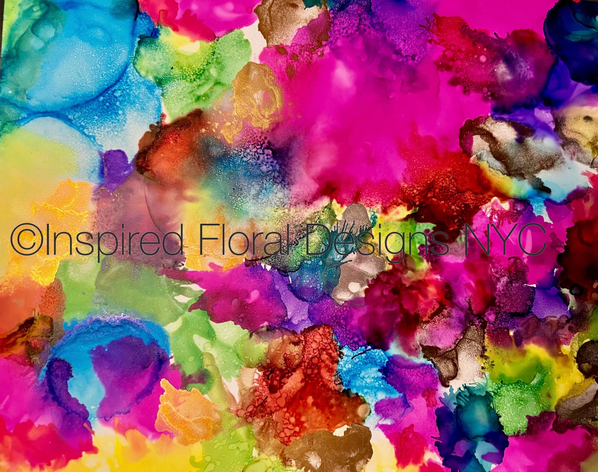 Vibrant abstract floral alcohol ink design by Barbara at Inspired Floral Designs NYC with splashes of magenta, pink, purple, blue, green, yellow, orange, and brown, overlaid with the text 'Inspired Floral Designs NYC Copyright