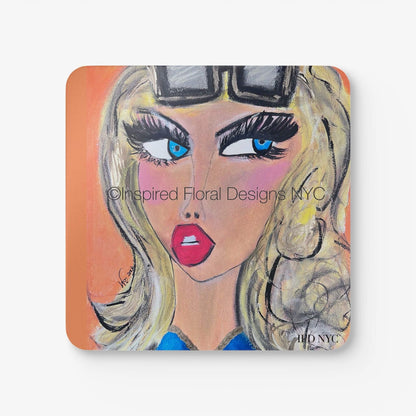 Monaco Power Gals single coaster close-up bold blonde character with blue eyes and red lips by Whitney at Inspired Floral Designs NYC