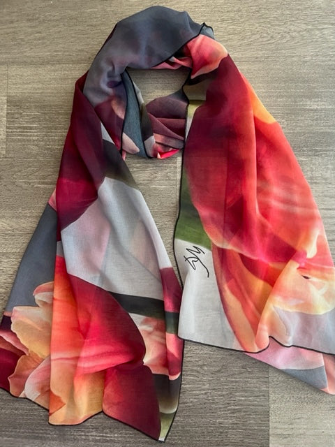 ure vibrant colors! This scarf titled "Étendre" is a head turner for sure! Stunning poly georgette material measuring 25x75 - The colors are vibrant and perfect as a shawl or scarf for Spring, Summer or really anytime of the year!