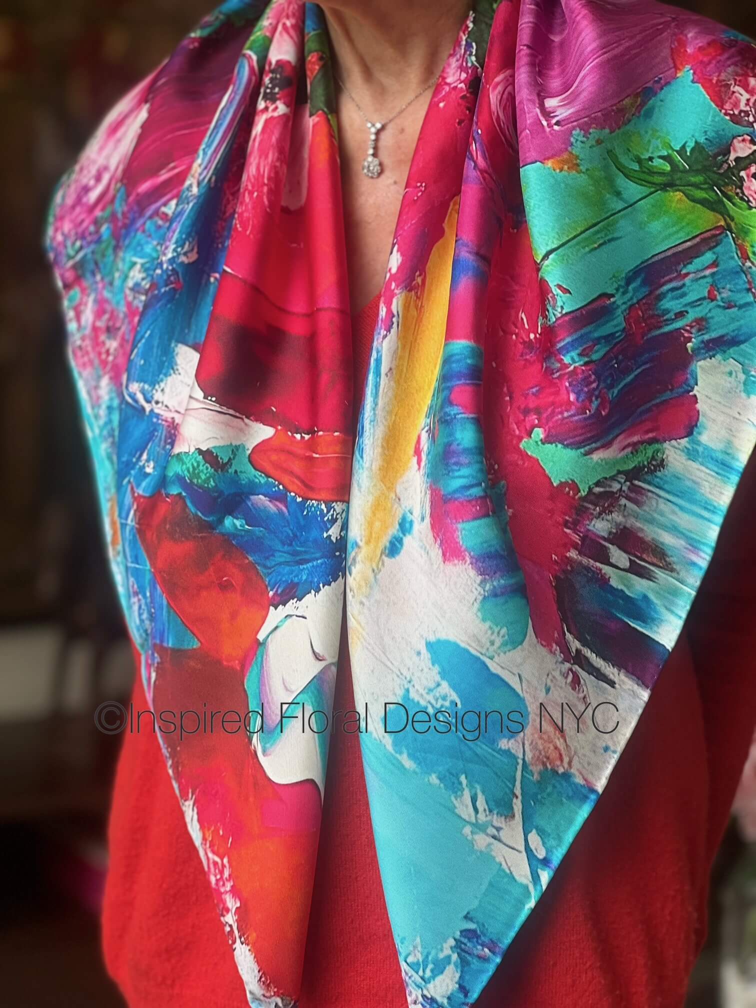Colorful abstract scarf by inspired floral designs nyc with 'Inspired Floral Designs NYC' branding title petals unleashed copyright