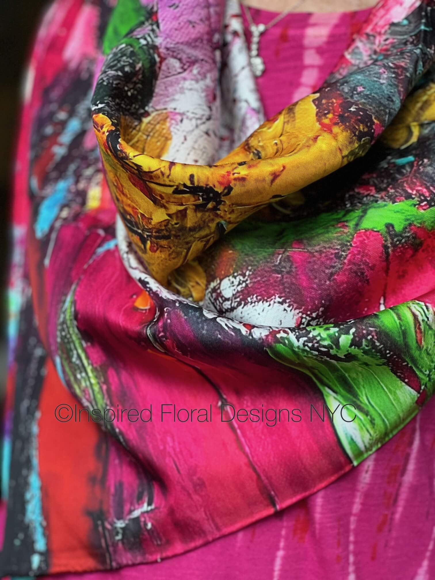 Colorful scarf with floral patterns and a yellow accent, petals in the wild by inspired by Floral Designs NYC copyright