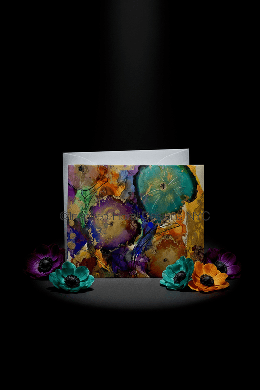 Colorful greeting card with abstract design on a black background by inspired floral designs nyc llc copyright
