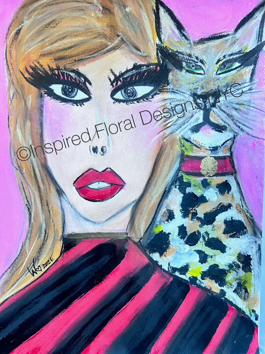 A colorful painted portrait featuring a woman's face with blonde hair, dramatic black eyelashes, red lips, and a spotted cat wearing a red collar, set against a bright pink background by Whitney at Inspired Floral Designs NYC. A diagonal watermark reads 'Inspired Floral Designs LLC' copyright