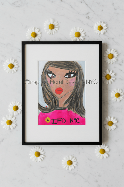 Framed artwork of a woman's face with 'IFD NYC' on a white background with daisies by whitney inspired floral designs nyc copyright 