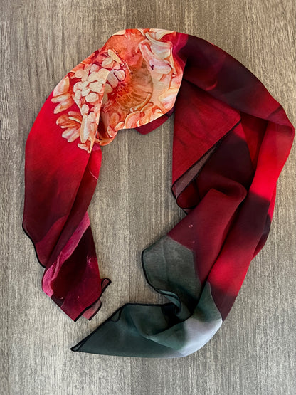 his stunning red floral scarf is entitled Amour. The colors are vibrant and perfect for a gorgeous pop of color around the neck, as a head scarf or even for the dog! vegan georgette fabric beautiful amour 