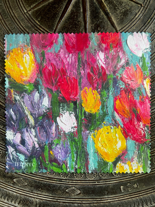 A colorful square-shaped glass/phone/camera lens cleaning cloth with floral patterns, crafted from microfiber material from original artwork by Whitney and Barbara at inspired floral designs nyc
