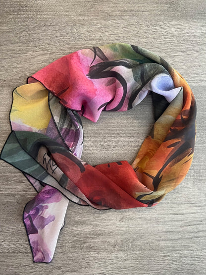  painted this gorgeous watercolor scarf entitled "Mimi" named after a dear friend that is made from vegan georgette fabric that feels like silk. The colors are vibrant and bold. Sophisticated and elegant, these scarves are made from vegan georgette fabric that feels like silk, but with more durability.