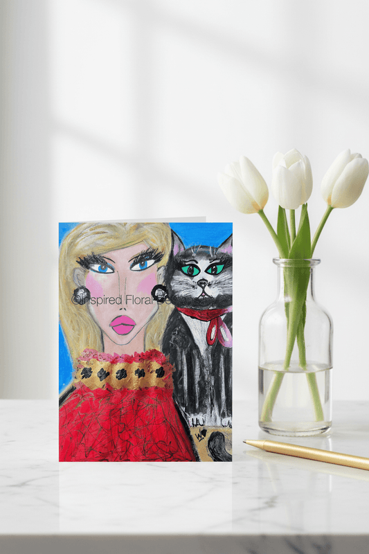 Card with a stylized illustration of a woman and a cat, next to a vase with white tulips on a marble surface by whitney inspired floral designs nyc llc copyright
