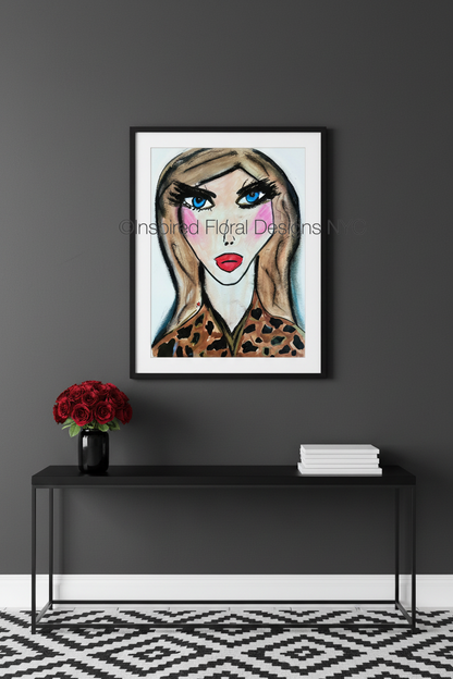 stylized face by whitney inspired floral designs nyc framed on gray wall with console books and red flowers copyright 